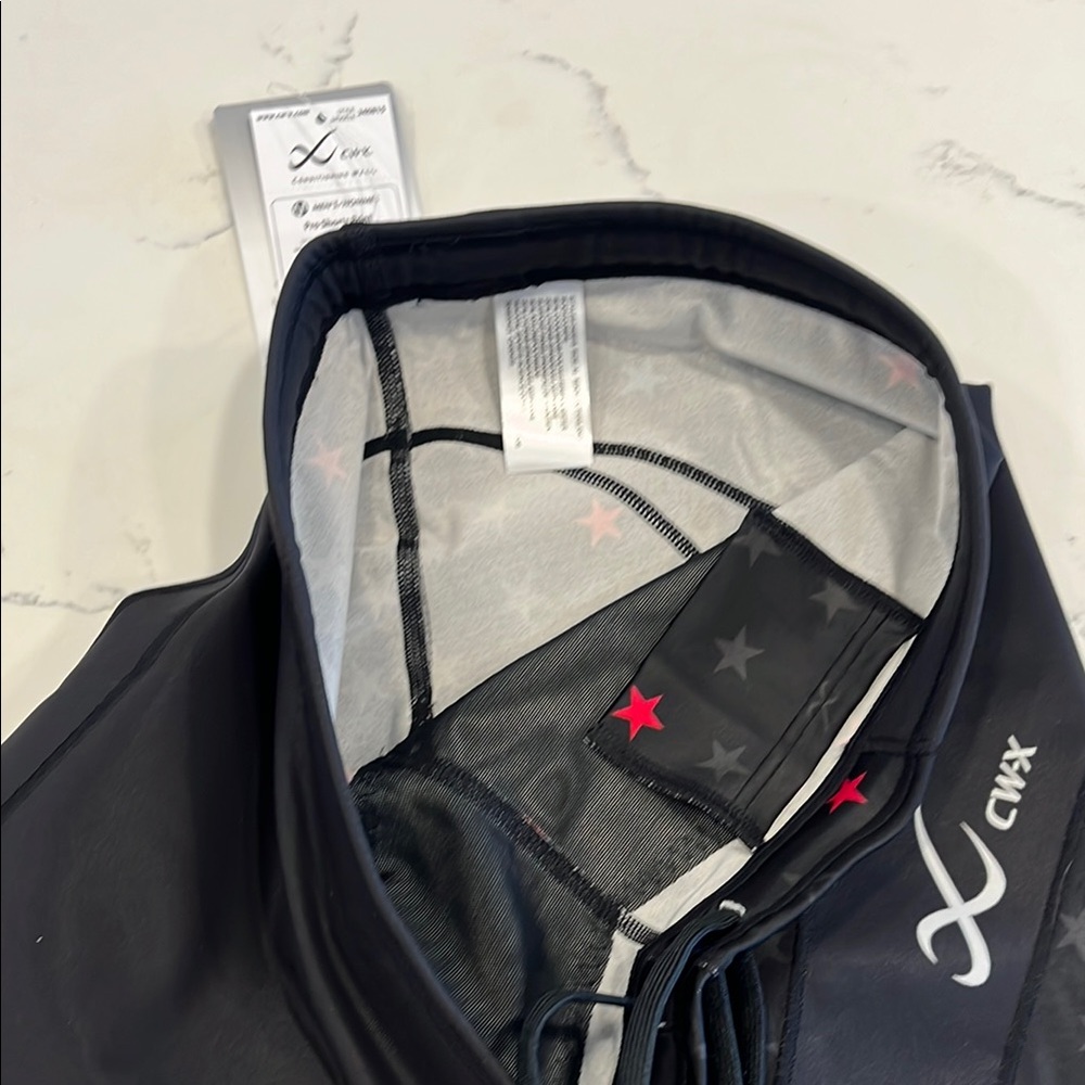 CW-X Men's Black Compression Shorts with Red & Blue Star Accents - Picture 8 of 10
